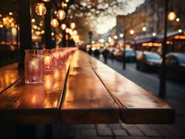 Christmas table blurred lights background, wood desk in focus photo