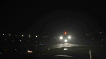 Airplane taxiing at night video