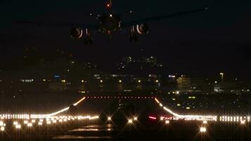 Airplane landing at night airport video