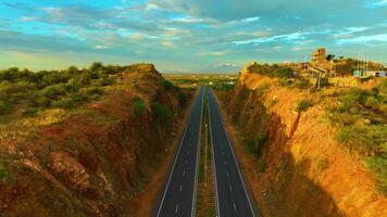 Canyon Like Mountains With a Highway In-between - Forwards video