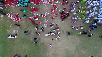Gorontalo, Indonesia - August 17, 2023-  Aerial view of Indonesian flag lowering ceremony witnessed by villagers. Indonesia Independence Day video
