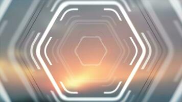 White glowing hi-tech hexagons on blurred sunset background video animation