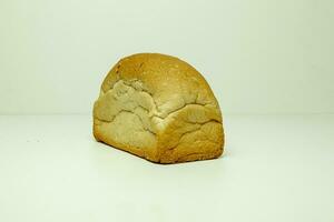 Loaf of bread isolated on a white background. Top view. photo