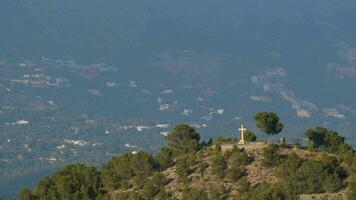 Christian cross on the mountain in La Nucia, Spain video
