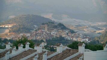 Polop scenery with greenhouses and mountainous landscapes around, Spain video