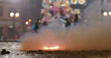 Burning firecracker flying away during Fallas celebration in Spain video