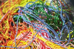 Multicolored colorful ropes and laces. Rope background. photo