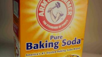 Dropping baking soda box with rack focus video