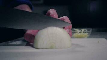 Man Dicing Onion with Chef Knife on Cutting Board video