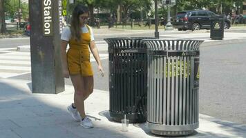 Young Woman Picks up Trash to Recycle in City Fighting Climate Change video