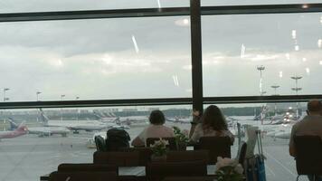 Airport lounge with passengers waiting for the flight video