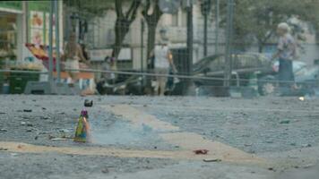 Kid lighting a fuse of a firecracker on Las Fallas video