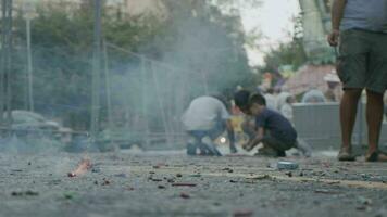 Children and exploding firecracker on Las Fallas, Spain video