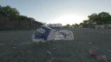 Wind blowing leaves and litter in the city video
