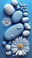 A blue flower and stone background photo