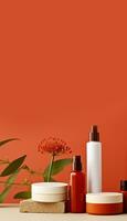 Cosmetic bottle containers with red and orange background. photo