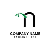 N logo design with leaf combination vector