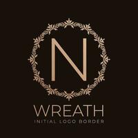 letter N wreaths border initial vintage logo design vector