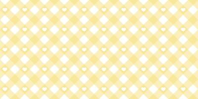 Gingham heart diagonal seamless pattern in yellow pastel color. Vichy plaid design for Easter holiday textile decorative. Vector checkered pattern for fabric - blanket, tablecloth, dress, napkin.