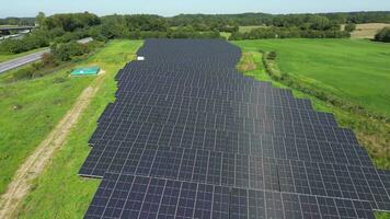 Aerial view of a large solar park for alternative energy production. video