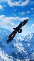 Majestic eagle soaring above a pristine, snow-capped mountain range under a blue sky photo