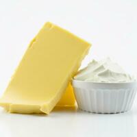 Butter on a cutting board on a white background. Generative AI photo