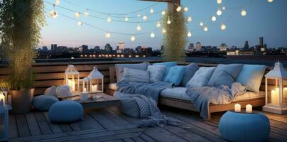 Rooftop terrace decorated with outdoor lighting and pillows photo