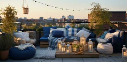 Rooftop terrace decorated with outdoor lighting and pillows photo