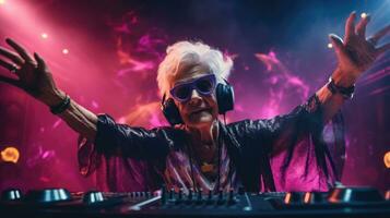 Bright elderly woman DJ at a rave. Techno party in the club. Grandma DJ. photo