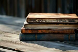 Old books on a wooden table. The concept of education photo