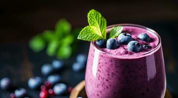 Blueberry smoothie selective focus detox diet food vegetarian food healthy eating concept. photo