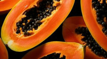 papaya, mitades de Fresco jugoso naranja tropical fruta. foto