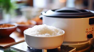 Rice in electrical rice cooker photo