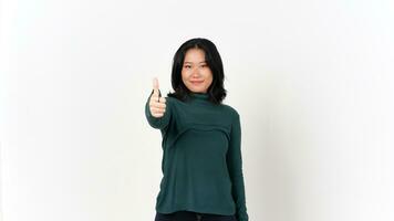 Smiling looking at camera and Showing Thumbs Up Of Beautiful Asian Woman Isolated On White Background photo