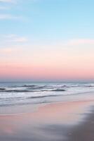 Tranquil beach scene at twilight with soft sunset colors blending into sky for ample copy space photo