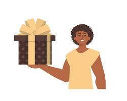 A man is holding a gift box. Modern style. Vector. vector