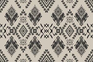 Ikat paisley embroidery on the fabric in Indonesia,India and asian countries.geometric ethnic oriental seamless pattern.Aztec style. illustration.design for texture,fabric,clothing,wrapping,carpet. vector