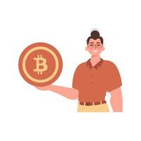 The guy is holding a bitcoin in the form of a coin. Character with a modern style. vector