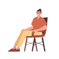 The man is sitting in a chair. Character in modern trendy style. vector