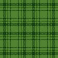 Plaid seamless pattern in green. Check fabric texture. Vector textile print.