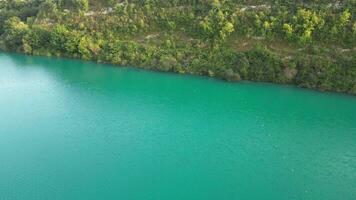 Blue lake with water houses video