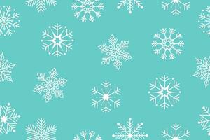 Seamless vector pattern with snowflakes. vector background. Christmas background from snowflakes of different shapes. Vector illustration.