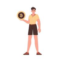 un hombre sostiene un bitcoin en su manos. personaje en moderno de moda estilo. vector