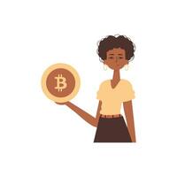 A woman holds a bitcoin in her hands in the form of a coin. Character with a modern style. vector