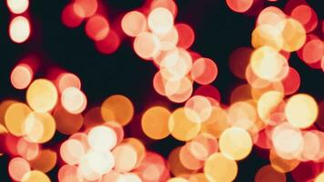 Blurred christmas background and yellow bokeh defocus lights. video