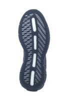 Black polypropylene shoe sole with white stripes isolated on white background. photo