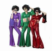 Disco style girls in colorful flared suits and African American wigs on a white background. Seventies or eighties style. photo