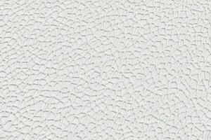 White paper wallpaper texture with abstract raised cells close up. Plastered embossed wall. photo