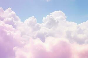 Fluffy clouds on a pastel color photo