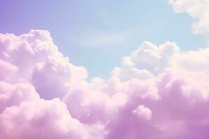 Fluffy clouds on a pastel color photo